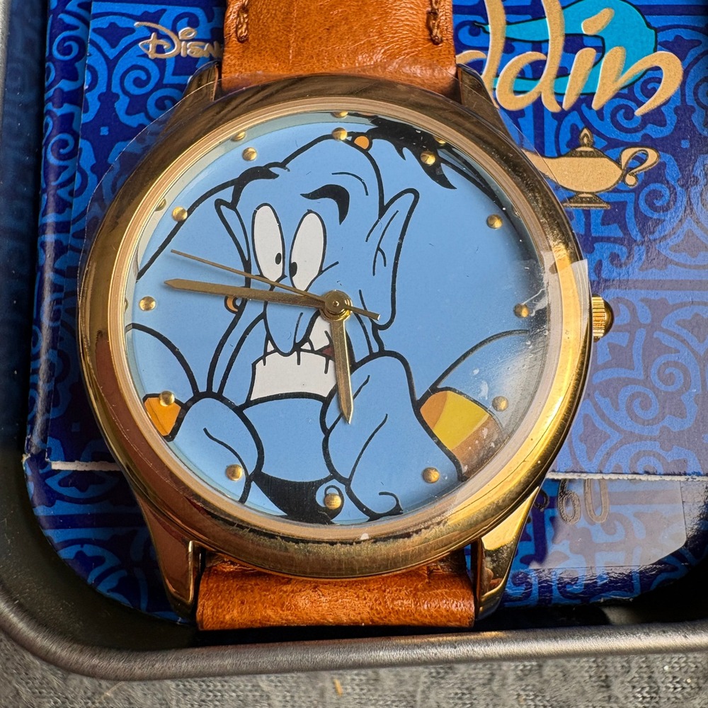 Vintage Fossil Disney Aladdin Genie Watch Gold Tone Case Brown Leather Band Tin